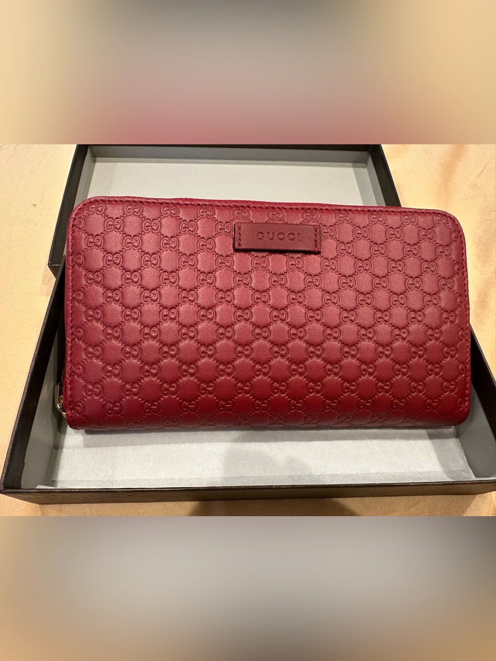 Gucci Embossed GG Leather Clutch in Red Brand New with Box.